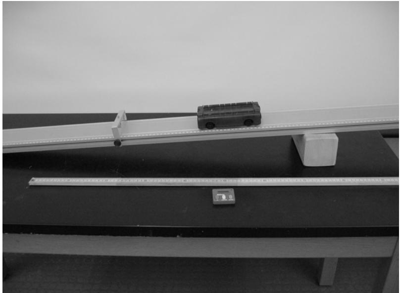 Cart on an inclined track.